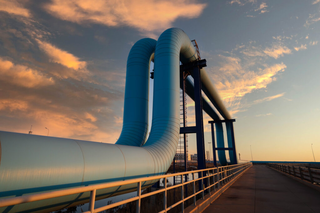 An oil pipeline at sunset.