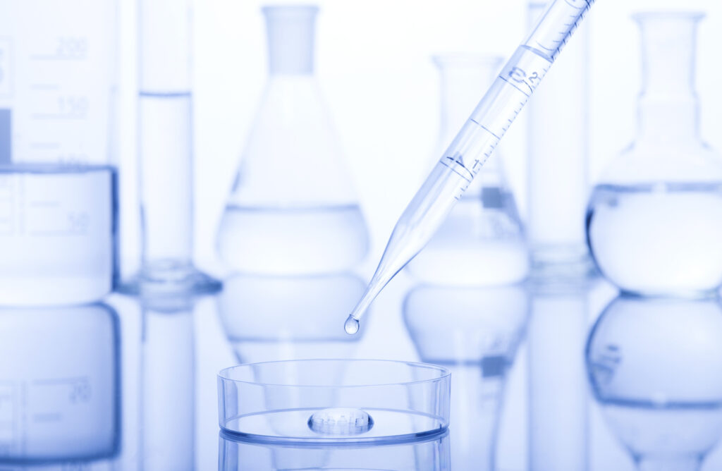 Test tubes on a blue and white background.